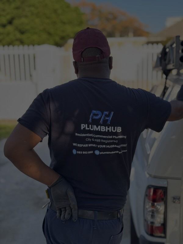 A Plumbhub plumber at the service vehicle, ready to go